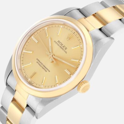Rolex Oyster Perpetual 14203 Steel Yellow Gold Champagne Dial