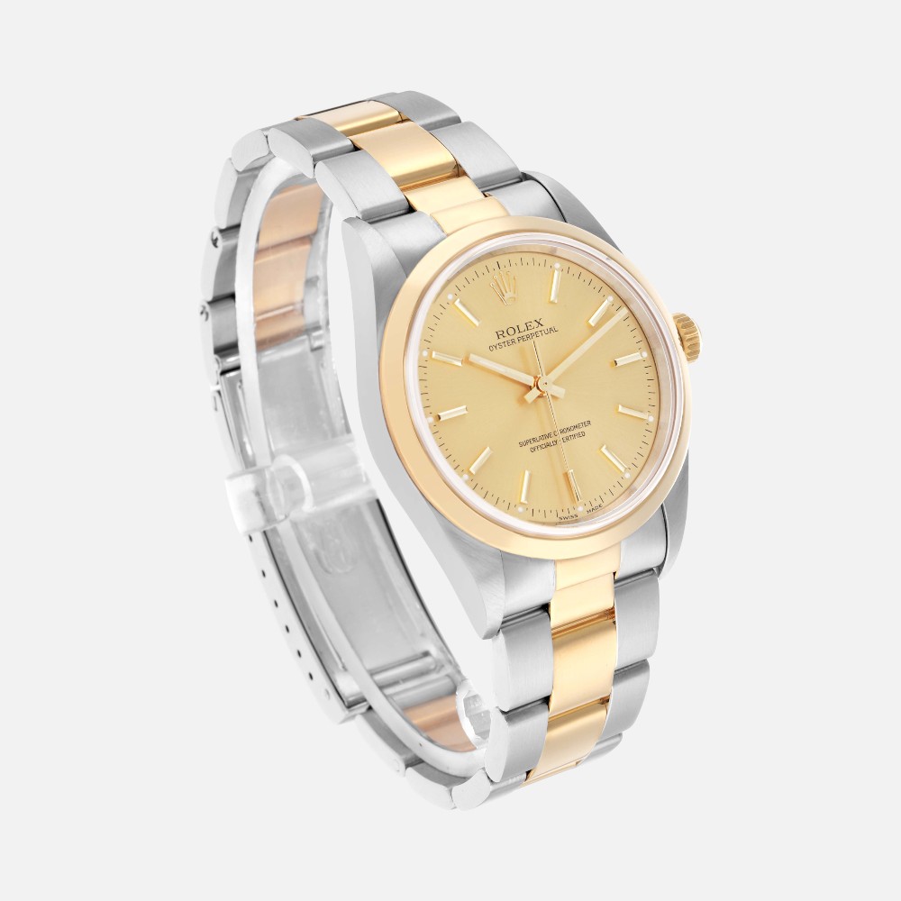 Rolex Oyster Perpetual 14203 Steel Yellow Gold Champagne Dial